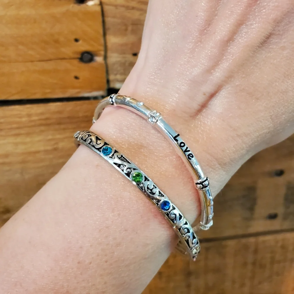 Set of 2 silvertone elastic bangles w/ pastel rhinestone details, love, hearts